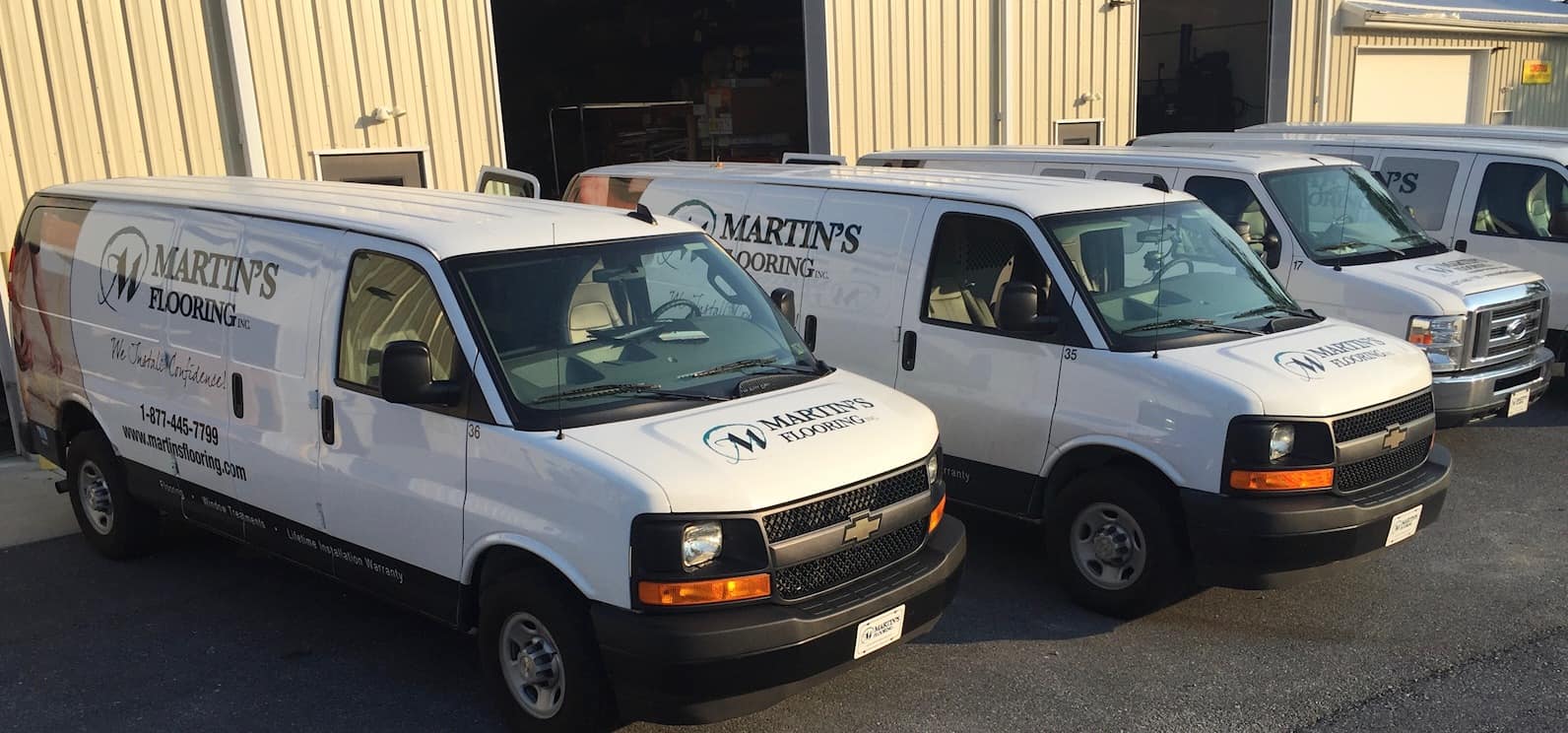 Martin's Flooring fleet of flooring installation trucks
