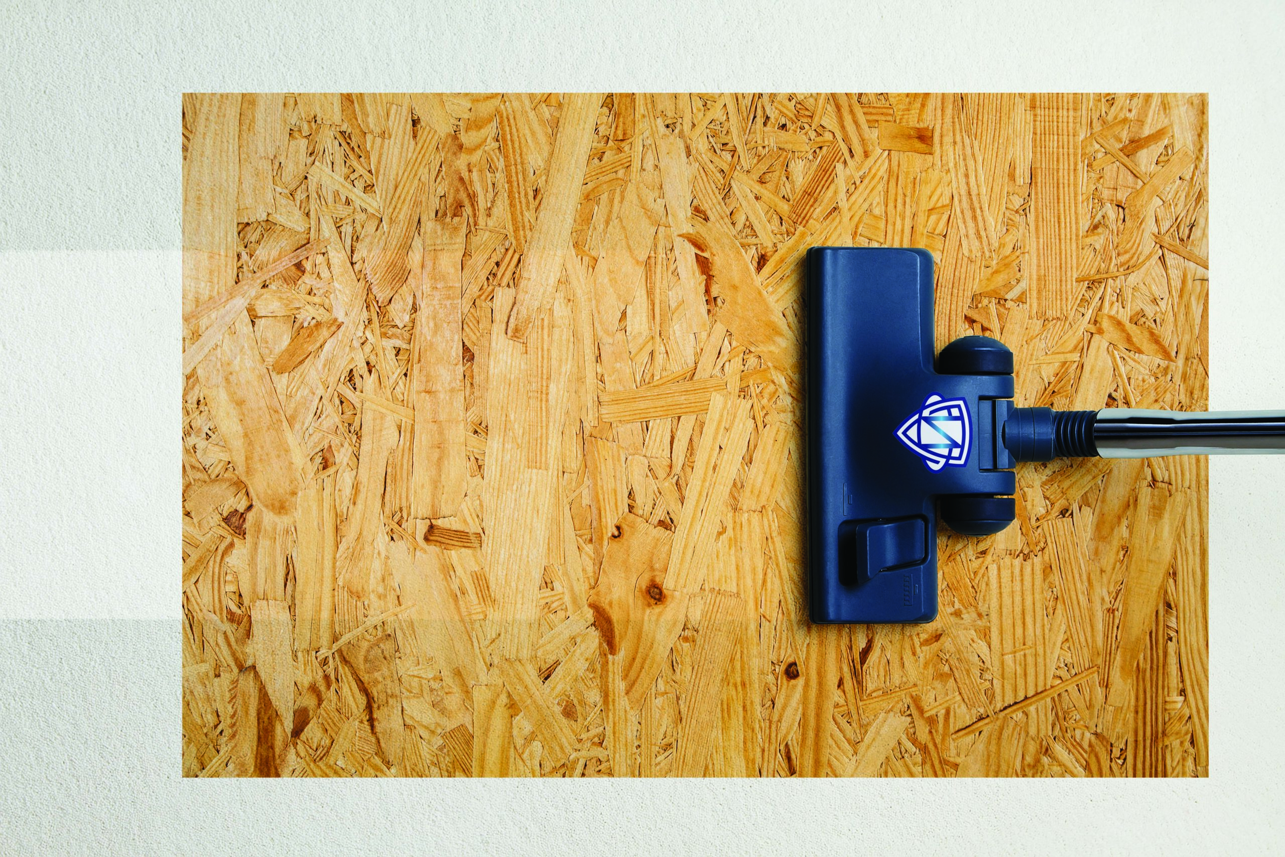 Vacuum cleaner on dirty carpet with copy space
