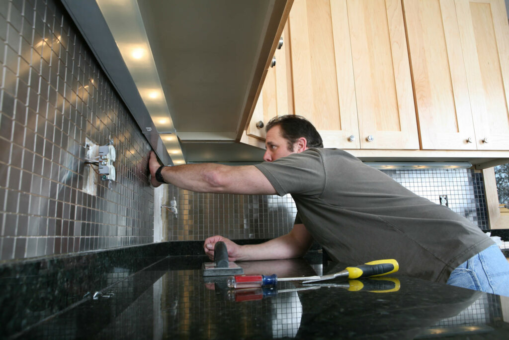 metal tile installation in kitchen