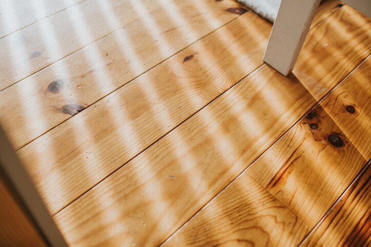 wood flooring planks with grain and knots