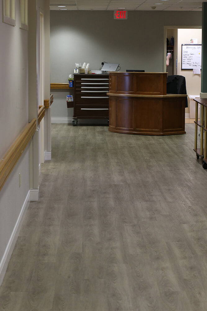 Fairmount Homes hallway flooring installation from Martins Flooring