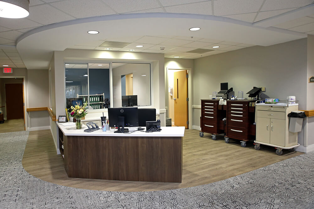 Fairmount Homes reception desk flooring and carpet installation from Martins Flooring