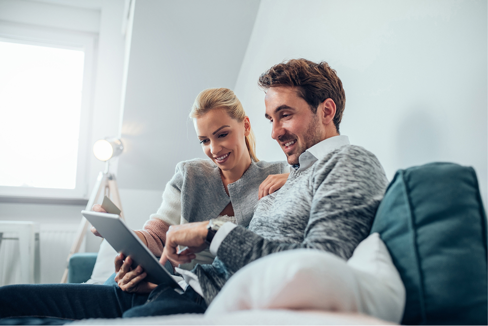 Couple shopping at home for flooring